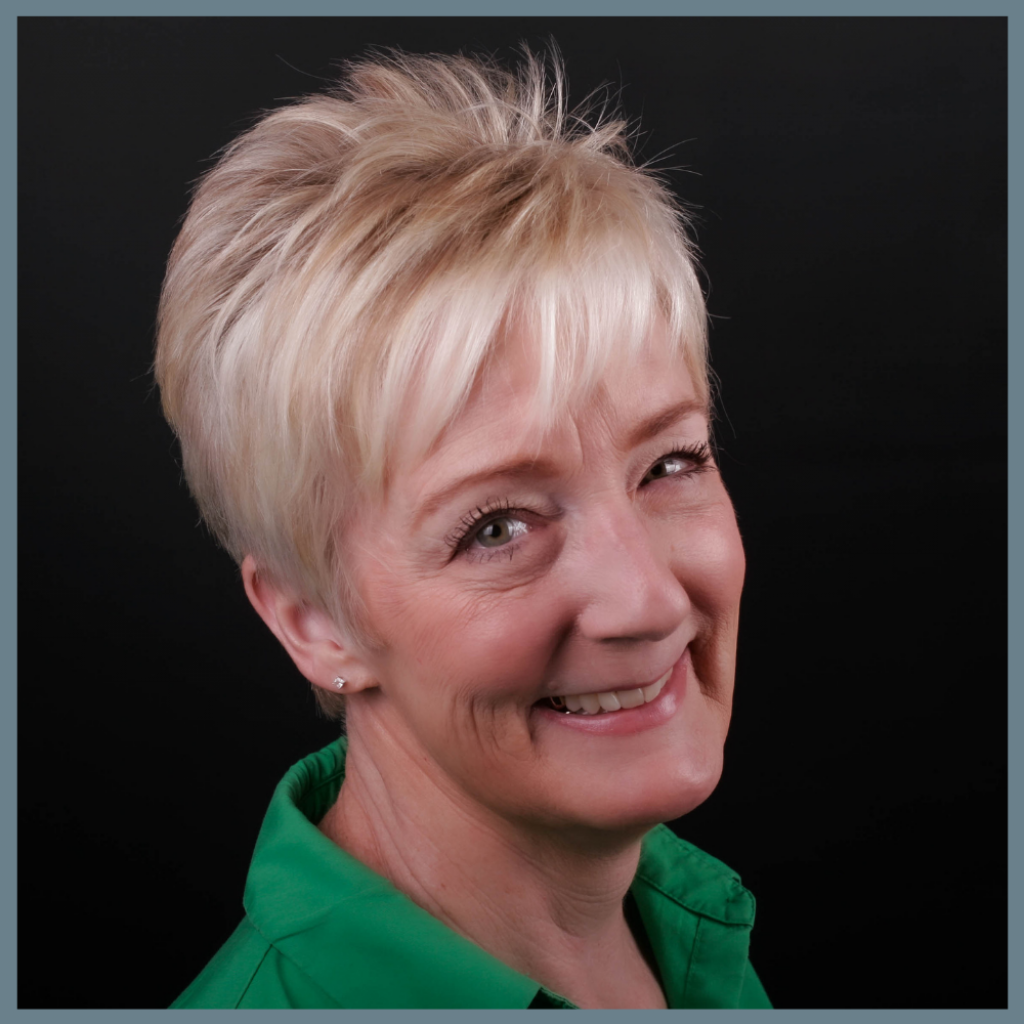 marie-k-framed Portrait of Marie K, registered dental hygienist certified in EMS and laser therapy at Kellogg & Latz Dentistry.